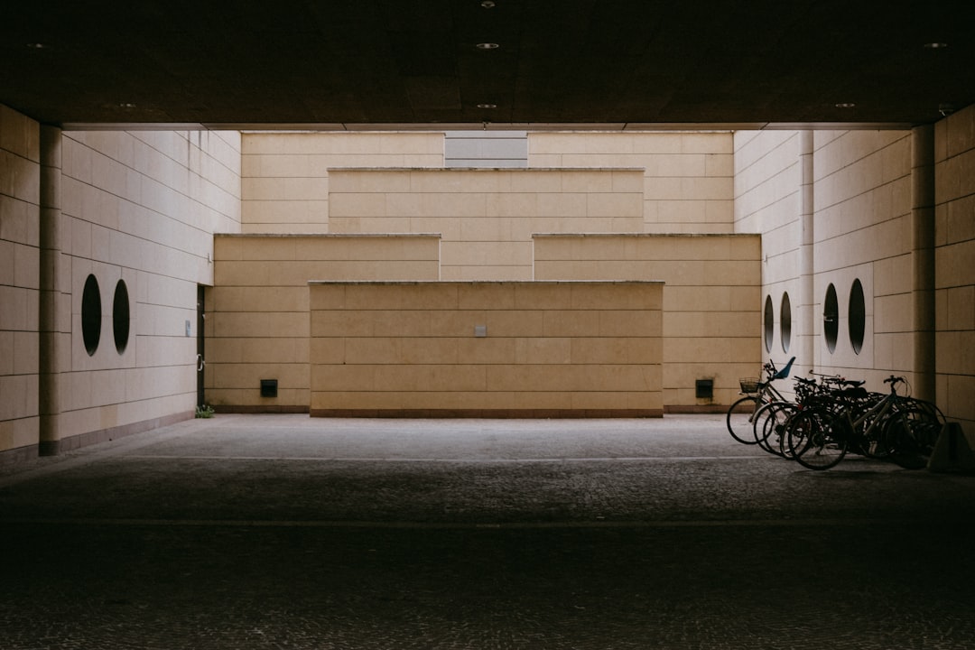 why-choose-us a-couple-of-bikes-parked-in-a-parking-garage-flkcwohxiu8